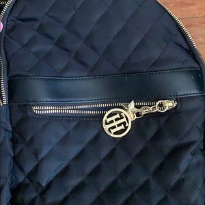 Mini black quilted backpack
